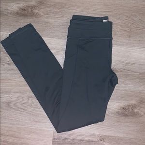 high waisted teal ankle leggings with leg pocket size small